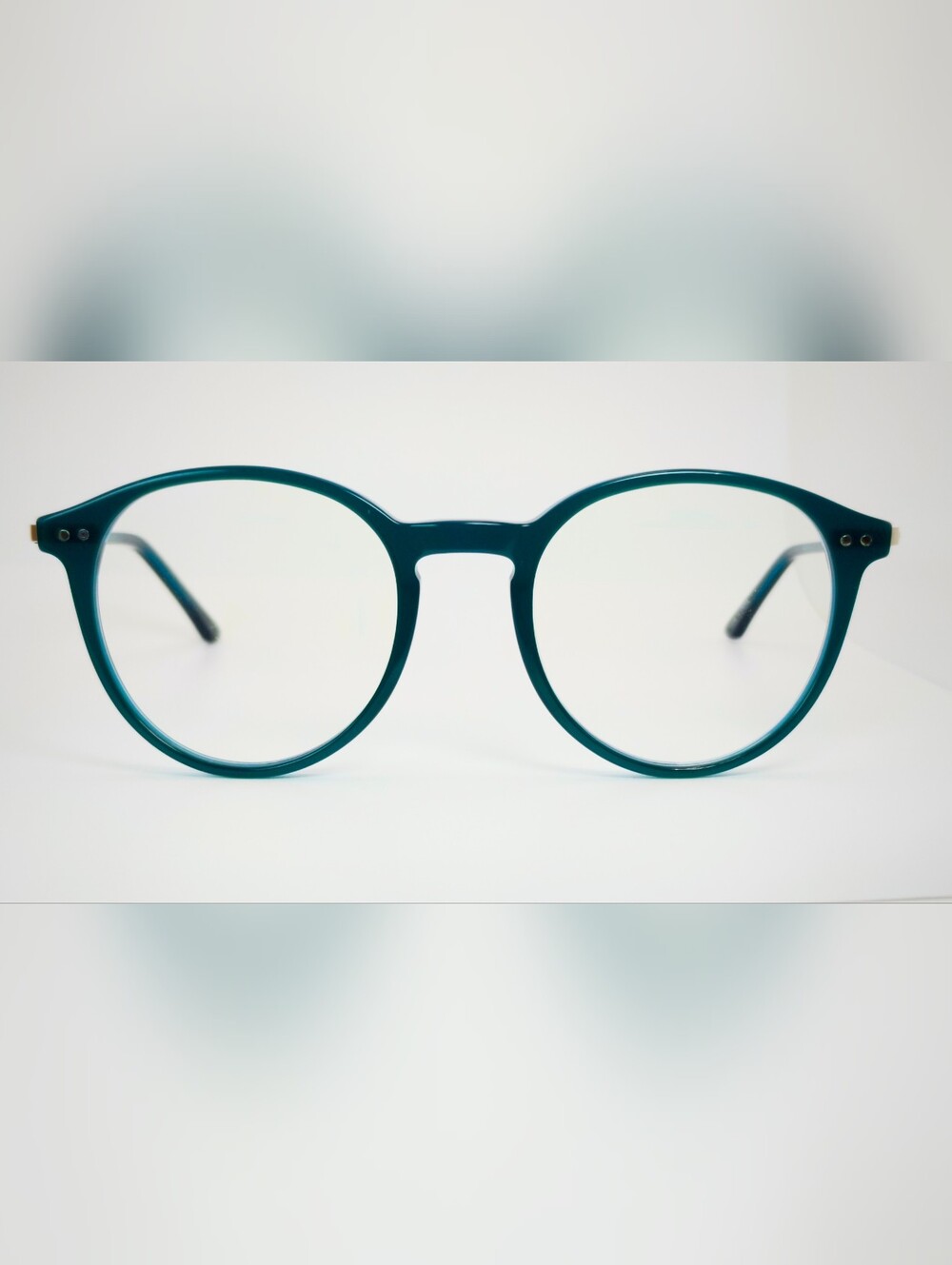 Riviere RFLKT. Jade Green Round Glasses.  Subtle Silver Highlights Frame Front